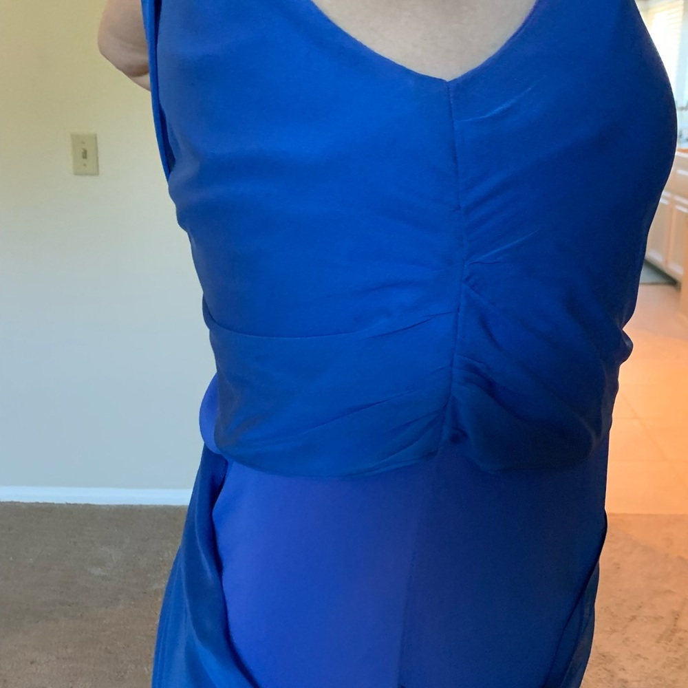 Blue dress with zipper on the side. Two tone, one shoulder strap, knee height